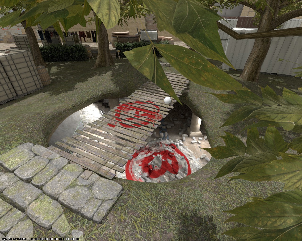 Backyard Escalation bombsite with two objective areas stacked vertically